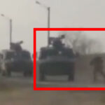 Viral Video :A Ukrainian throws himself in front of Russian military Trucks to stop the invaders